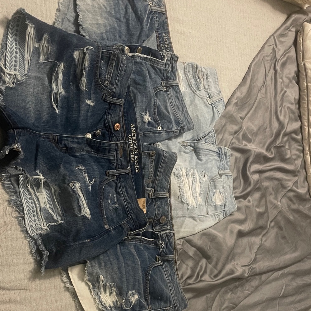 American Eagle Outfitters Women's Ripped Denim Shorts - Dark and Light Blue.